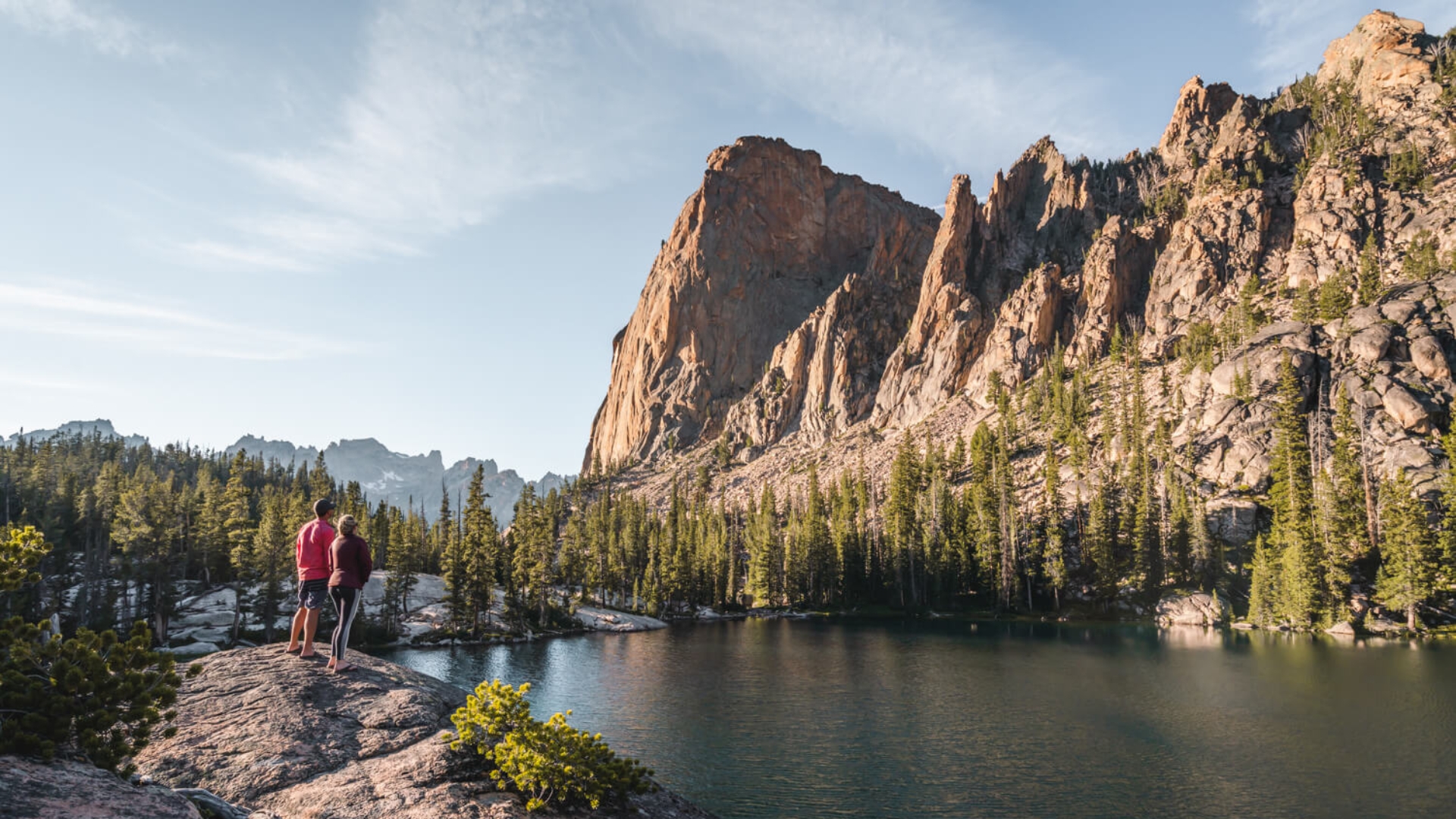 Two people standing looking at the Elephant's Perch, Idaho